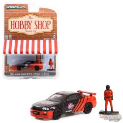 1999 Nissan Skyline (R34) with Race Car Driver - The Hobby Shop Series 13 - 1/64 Greenlight - 97130 E