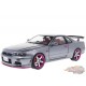 Nissan Skyline GT-R R34 de 1999 - Argent avec accents violets métallisés -  Solido  1/18 - S1804310 -   Passion Diecast 