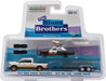 Blues Brothers - 2015 Ram 1500 Avec 1974 Dodge Monaco "Bluesmobile" on Flatbed Trailer -Greenlight 1/64 - 31010 C - Diecast 