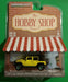 2015 Jeep Wrangler Unlimited Rubicon Hard Rock with Backpacker - Hobby Shop Series 8 - 1/64 Greenlight-  97080 F