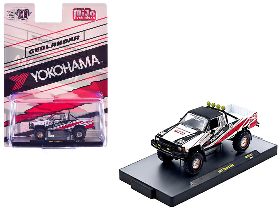 (Preorder) 1985 Toyota 4×4 Off-Road Pickup Yokohama Geolandar - White - M2 Machine - 1:64 - 31500-MJS101
