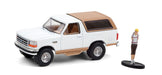 1996 Ford Bronco Eddie Bauer with Backpacker - The Hobby Shop Series 10 - 1/64 Greenlight - 97100 F