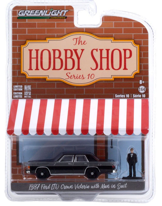 1987 Ford LTD Crown Victoria  with Man in Black Suit - The Hobby Shop Series 10 - 1/64 Greenligt -  97100 E