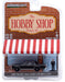 1987 Ford LTD Crown Victoria  with Man in Black Suit - The Hobby Shop Series 10 - 1/64 Greenligt -  97100 E