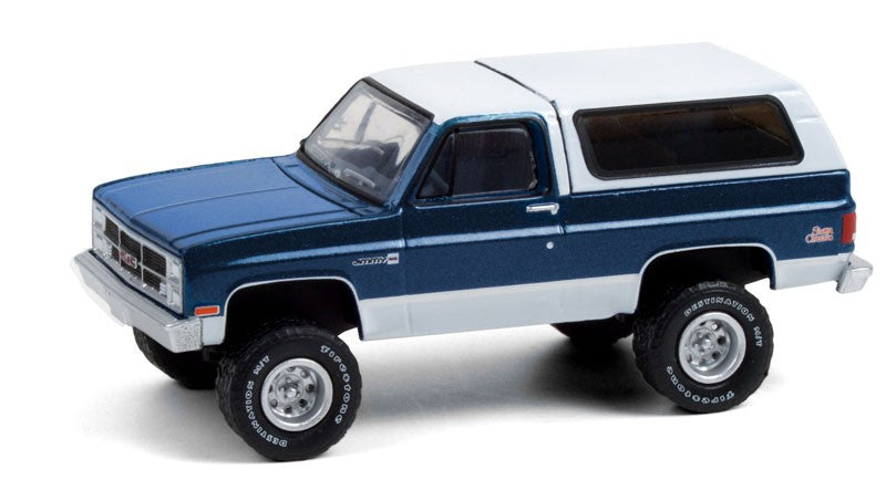 1987 GMC Jimmy Sierra Classic Lifted in Dark Blue and White - All-Terrain Series 11- 1/64 Greenlight - 35190 C