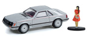 1979 Ford Mustang Coupe Ghia with Woman in a Dress - The Hobby Shop Series 12 - 1/64 Greenlight - 97120 B - Passion Diecast 