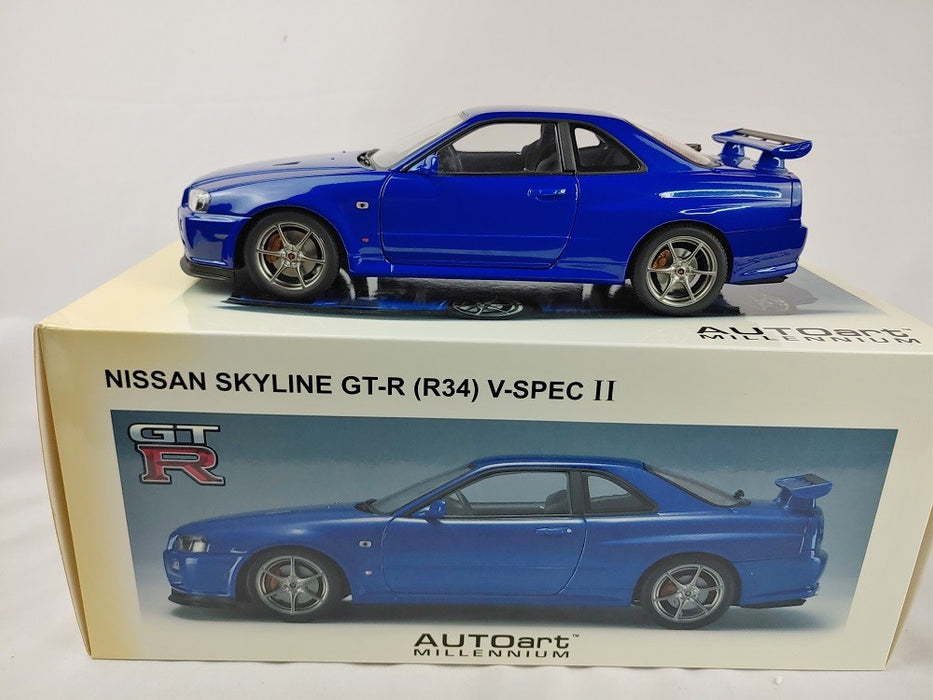Nissan Skyline GT-R (R34) V-spec II Bayside Blue - Autoart   1/18 - 77335  Used  Read