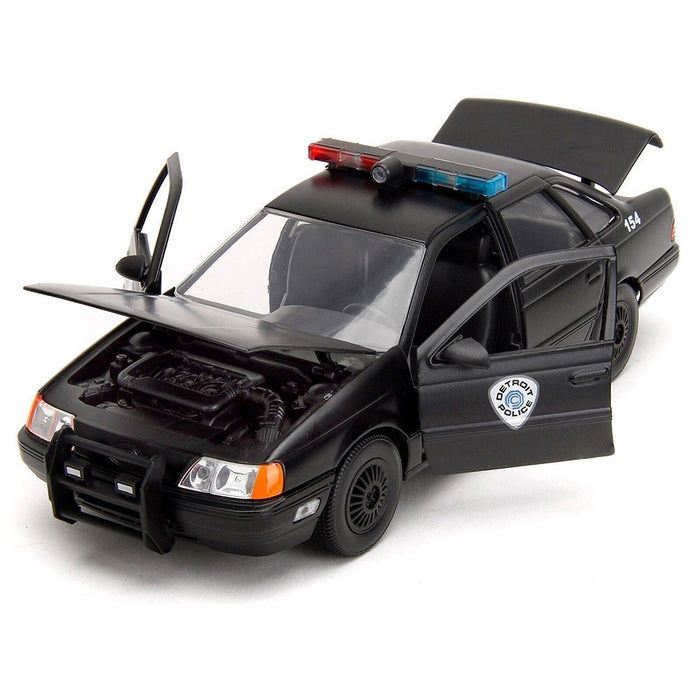RoboCop & OCP Ford Taurus Detroit Police (Matte Black) - RoboCop 35th Anniversary - Jada 1/24 - 33743 Passion Diecast