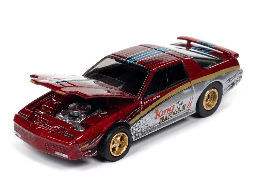 Pontiac Firebird GTA King of the Jungle 1987, couleur rouge métallique - Johnny Lightning 1/64 - JLMC034 A E Passion Diecast