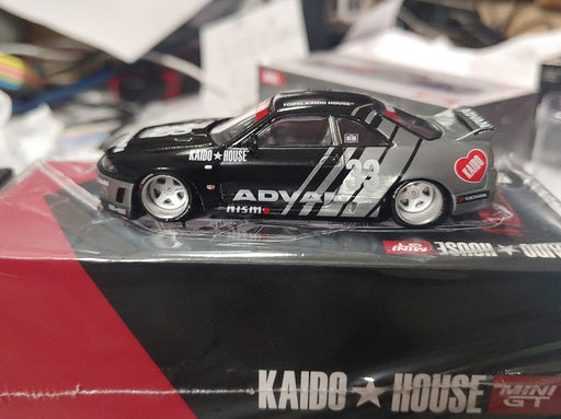 CHASE CAR Nissan Skyline GT-R (R33) Kaido Works ADVAN - Mini GT - Mijo Exclusives - 1/64 - KHMG191GR